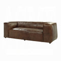 Brown leather sofa on a white background