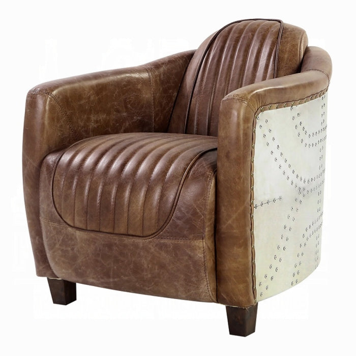 white background leather chair with arms brown leather matching through out aluminum siding wrapping the outer part of the arms leather pinned stitching stripped going down the middle and wooden square feet pegs 