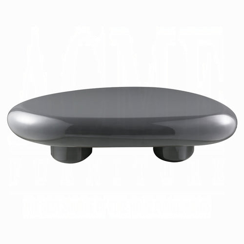 Round gray object with three cylindrical supports on a white background