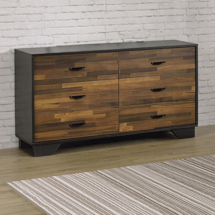 dresser with multi wood coloring panel 6 drawers black outer layer frame or top and sides black chunky feet and black handles displayed in a staged setting with a rug and white brick wall background 