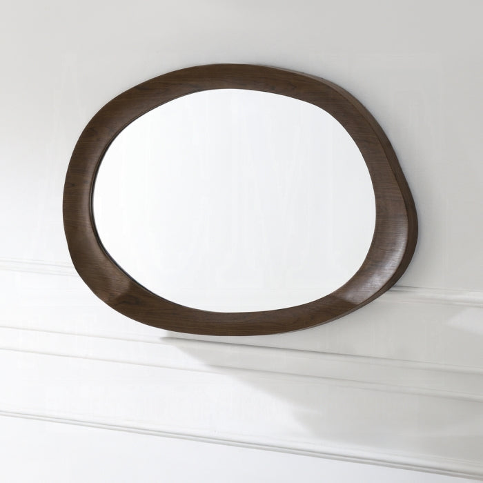 Round wooden mirror on a white wall