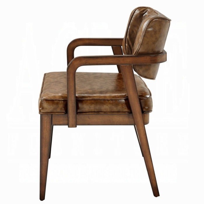 Brown leather armchair on a white background