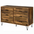 Wooden dresser with a patchwork design and black metal legs on a white background