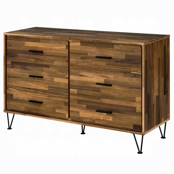 Wooden dresser with a patchwork design and black metal legs on a white background