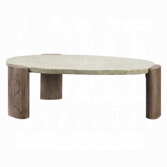 white background coffee table three legs cement appearance top with rock shape legs give a wooden earthy appearance 