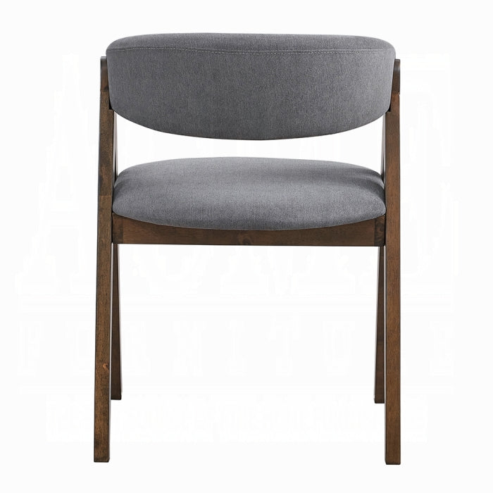 white background chair with grey fabric padding and matching grey fabric padding as a backrest that is slightly curved leaving an open middle portion frame is wooden medium brown with a triangle shape 