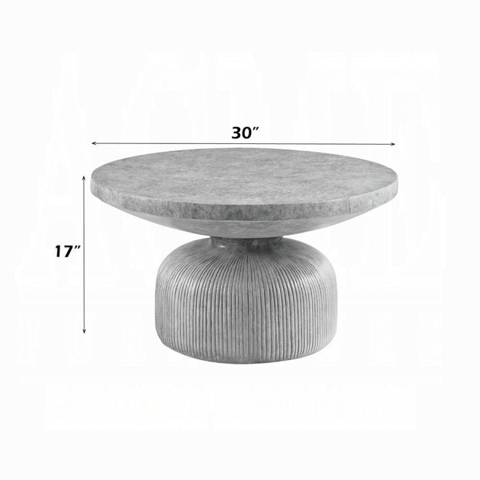 hour glass shape concrete appearance coffee table with ridged lines at the bottom and a round flat top white background measured at 7 inch tall and 30 inch wide 