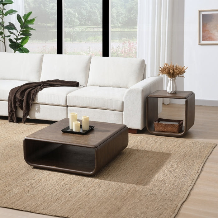 Modern living room with a white sofa, wooden coffee table, and side table.