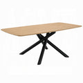 white background light wood color appearance table top rectantgular shape with black criss crossed legs 4 going in different directions 