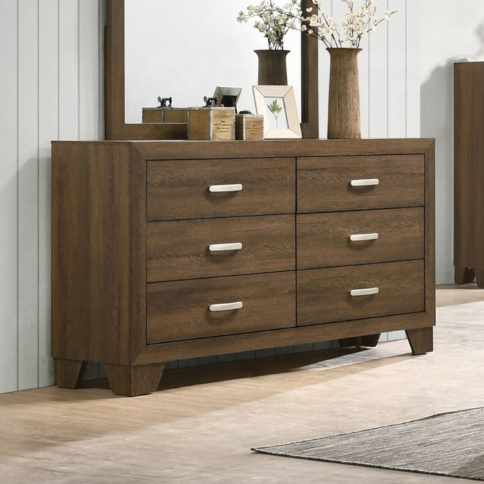 miquell dresser staged photo to show the potential flowers on top mirror on top a picture frame with carpet underneath 