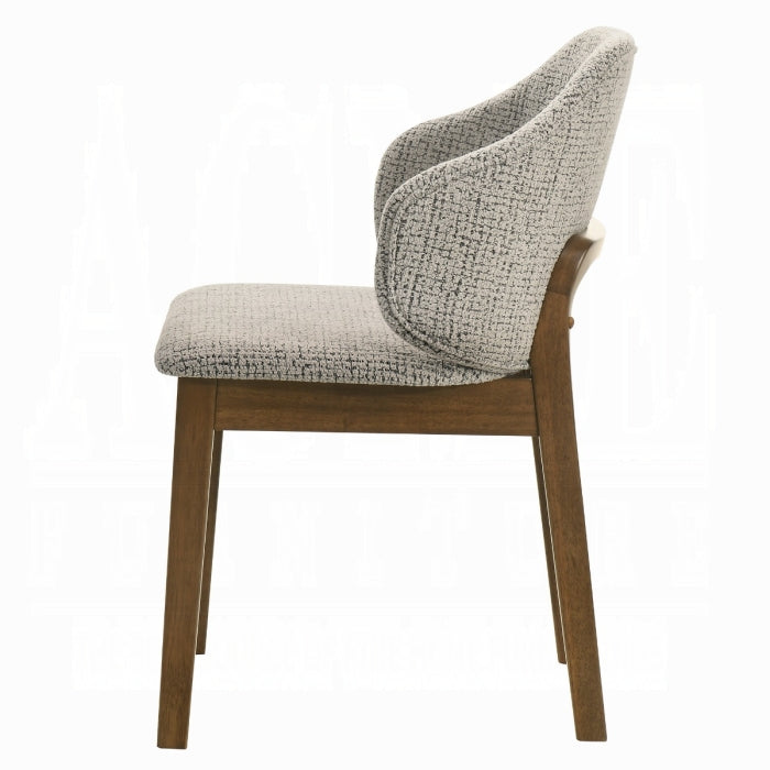 Chair with textured backrest and wooden legs on a white background