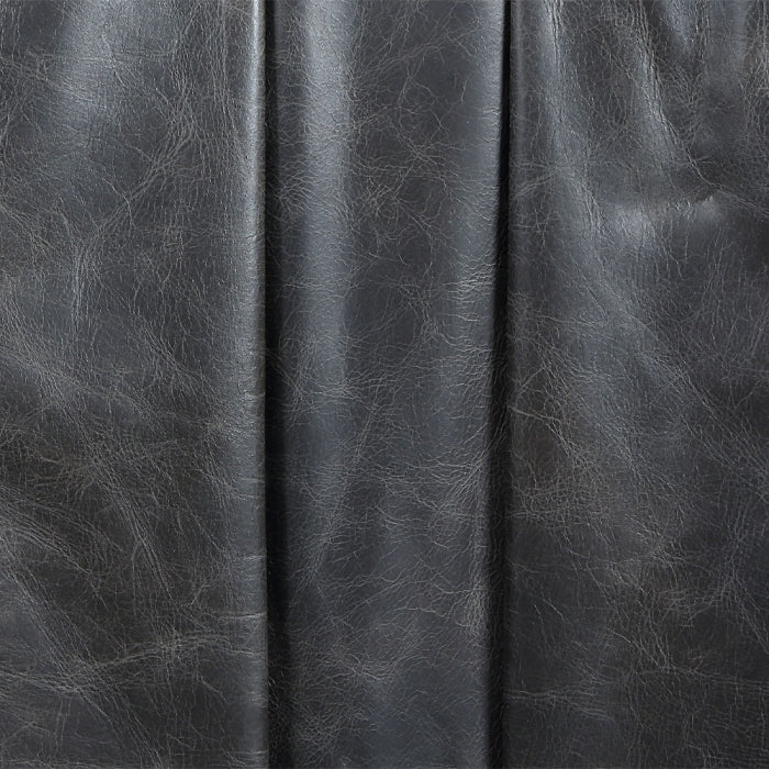 Close-up of dark gray leather texture