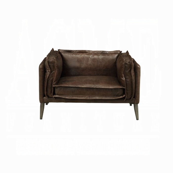 white background dark brown leather chair with plush pillows all around matching leather through out the chair 