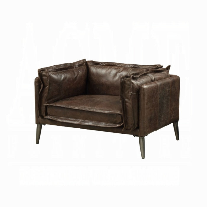 white background dark brown leather chair with plush pillows all around matching leather through out the chair 