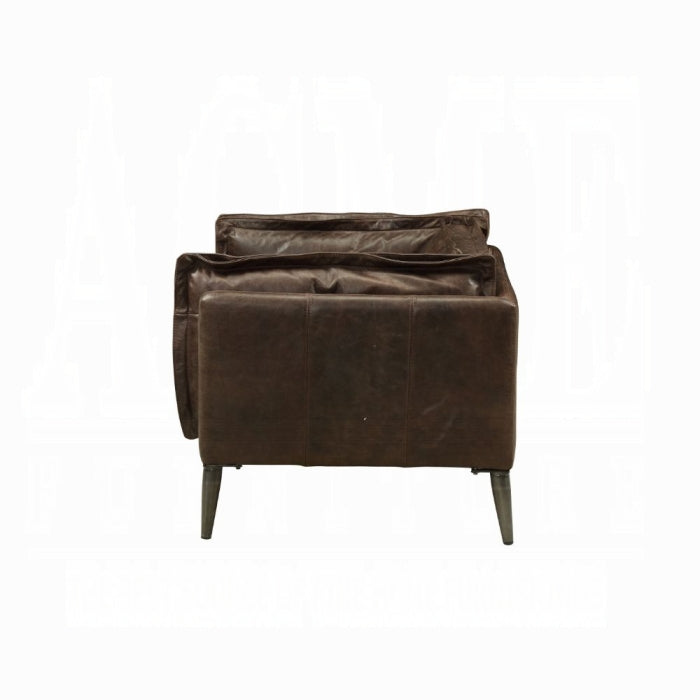 white background dark brown leather chair with plush pillows all around matching leather through out the chair 