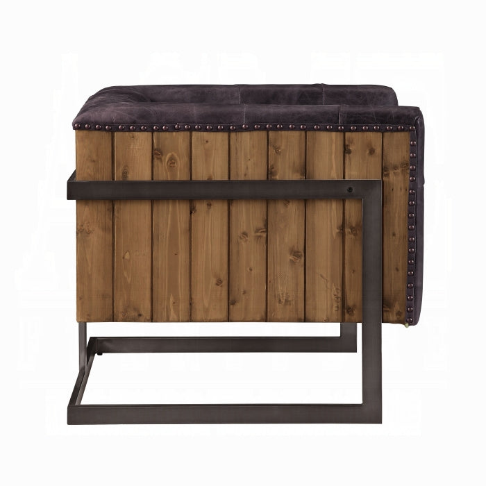 Wooden ottoman with dark cushion on a white background