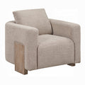 Beige armchair with wooden legs on a white background