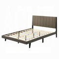 white background slated bed with grey fabric headboard padded with lines doing down skinny base 