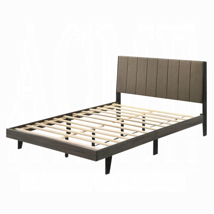 white background slated bed with grey fabric headboard padded with lines doing down skinny base 