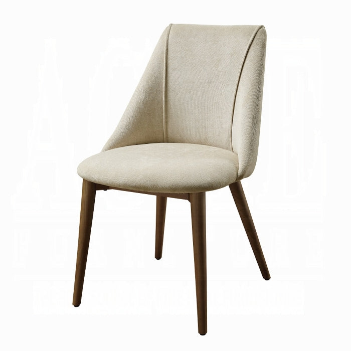white background chair with 4 wooden legs an a beige color high looking back 
