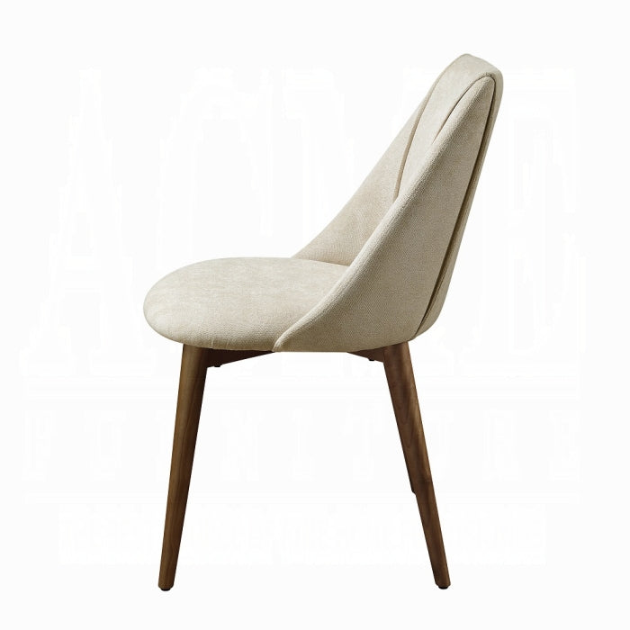 white back ground willene chair 4 wooden legs beige fabric dinning chair facing side profile 