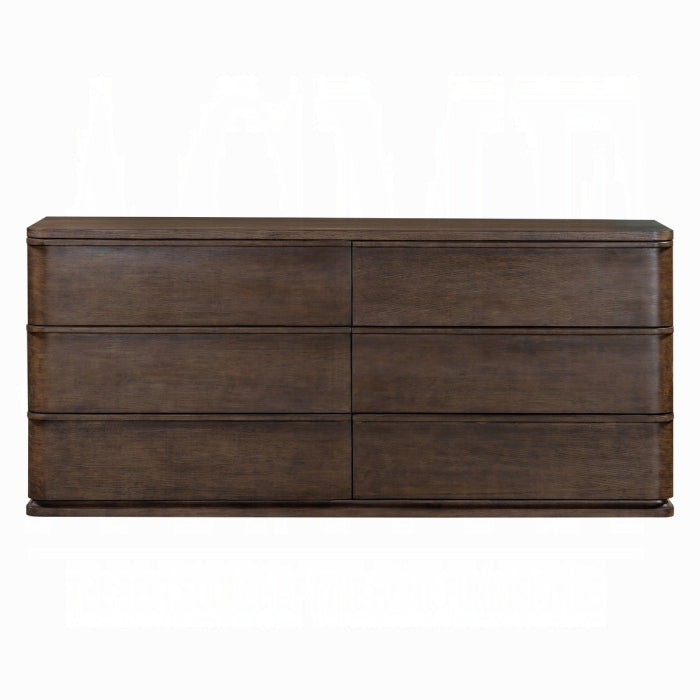Wooden dresser with four drawers on a white background