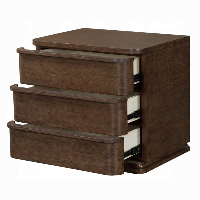 Wooden nightstand with three drawers on a white background