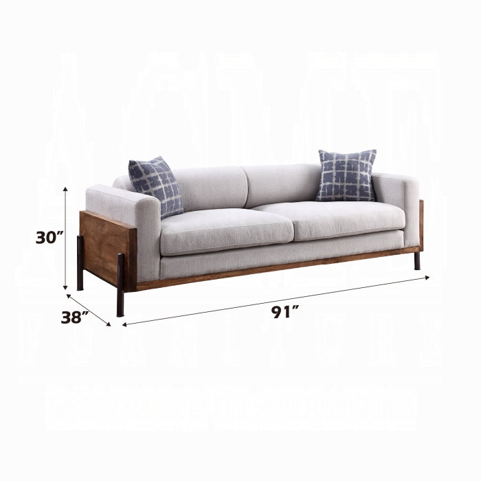 Gray sofa with wooden frame and blue patterned cushions, shown with dimensions on a white background.