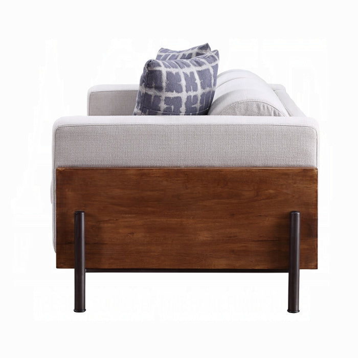 Sofa with wooden base and metal legs on a white background