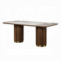 dining table with wooden circle legs and a marble look alike top